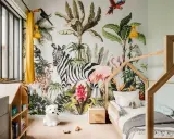 Une chambre d'enfant avec un mur jungle : zèbre, flamant rose, léopard, singe, toucan. Une excellente idée déco chambre enfant pour une aventure tropicale !