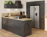 Plan cuisine moderne avec îlot central en béton ciré, réfrigérateur américain et hotte design.