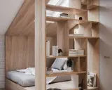 Une étagère en bois sépare astucieusement une petite chambre en deux, créant un coin nuit cosy et un espace de rangement.