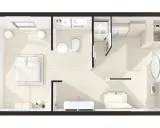 Plan d'une suite parentale avec chambre, salle de bain, dressing et coin salon.