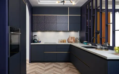 Cuisine moderne bleu nuit avec plan de travail en béton ciré. Une belle idée aménagement cuisine avec des portes à motifs géométriques et des touches dorées.
